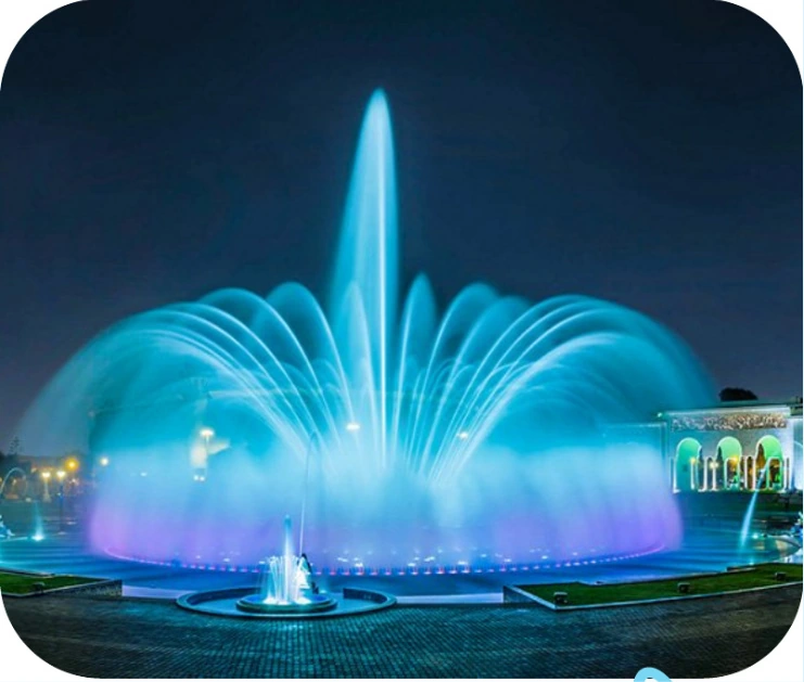 Fuente ornamental iluminada en azul en el Circuito Mágico del Agua